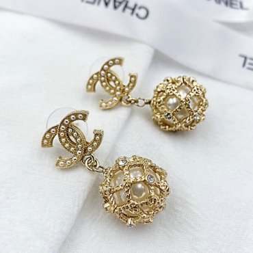 Сережки Chanel золотисті з обробкою